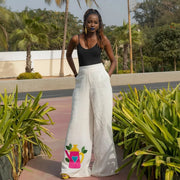 Pantalon large en lin blanc brodé