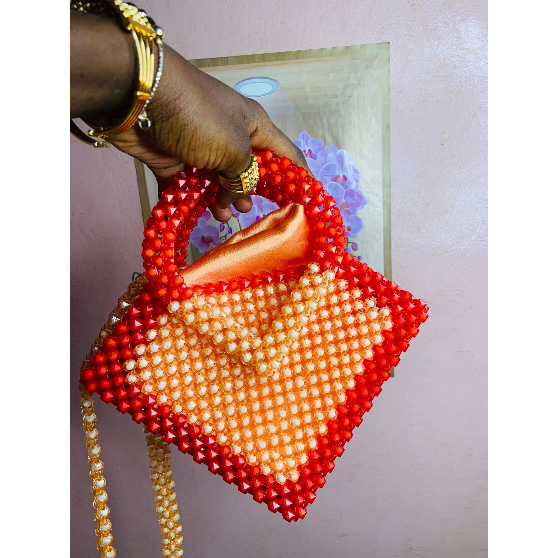 Sac à main en perles rouge et orange
