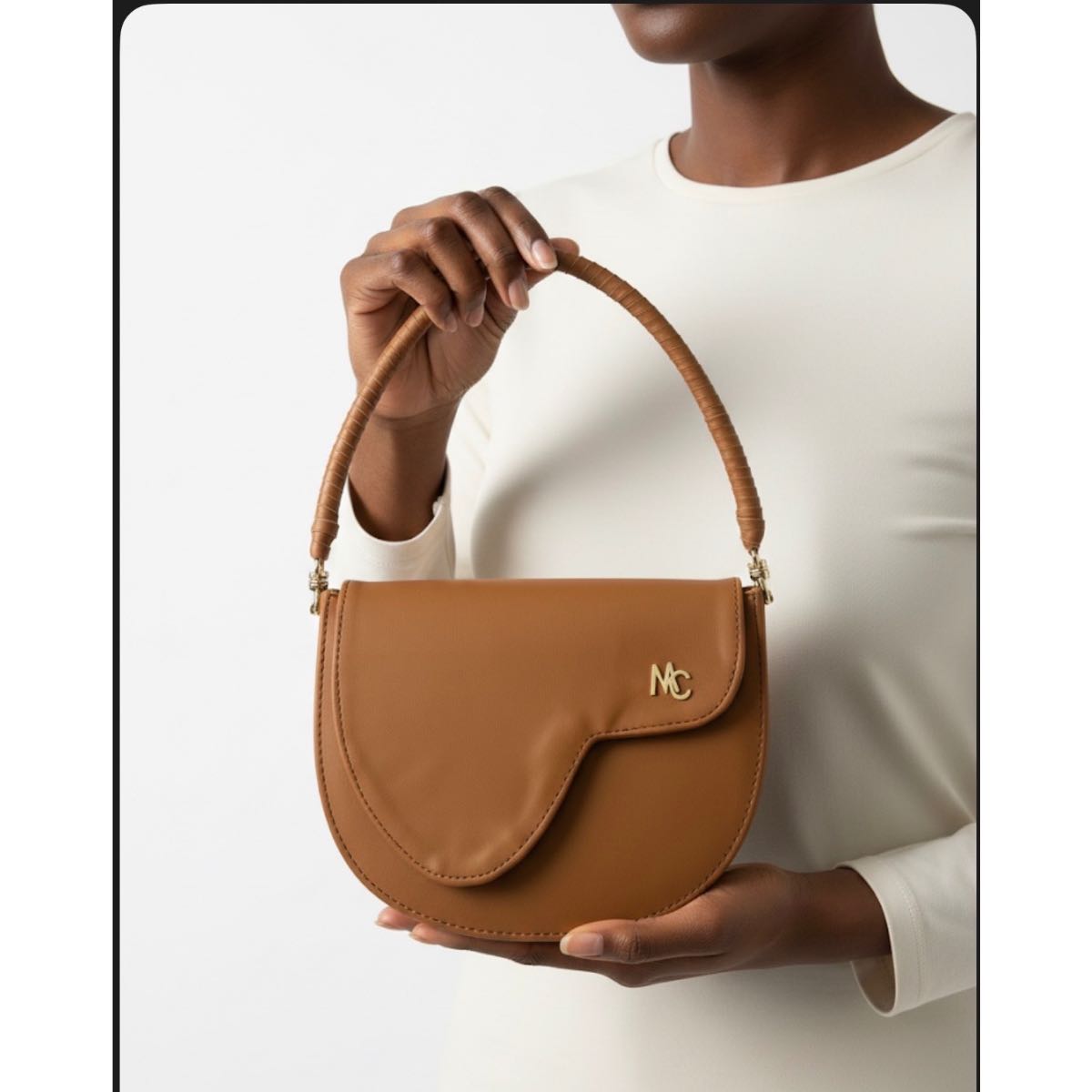 Sac à main cuir camel élégant femme, design contemporain et poignée tressée
