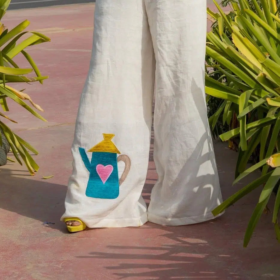 Pantalon large en lin blanc brodé