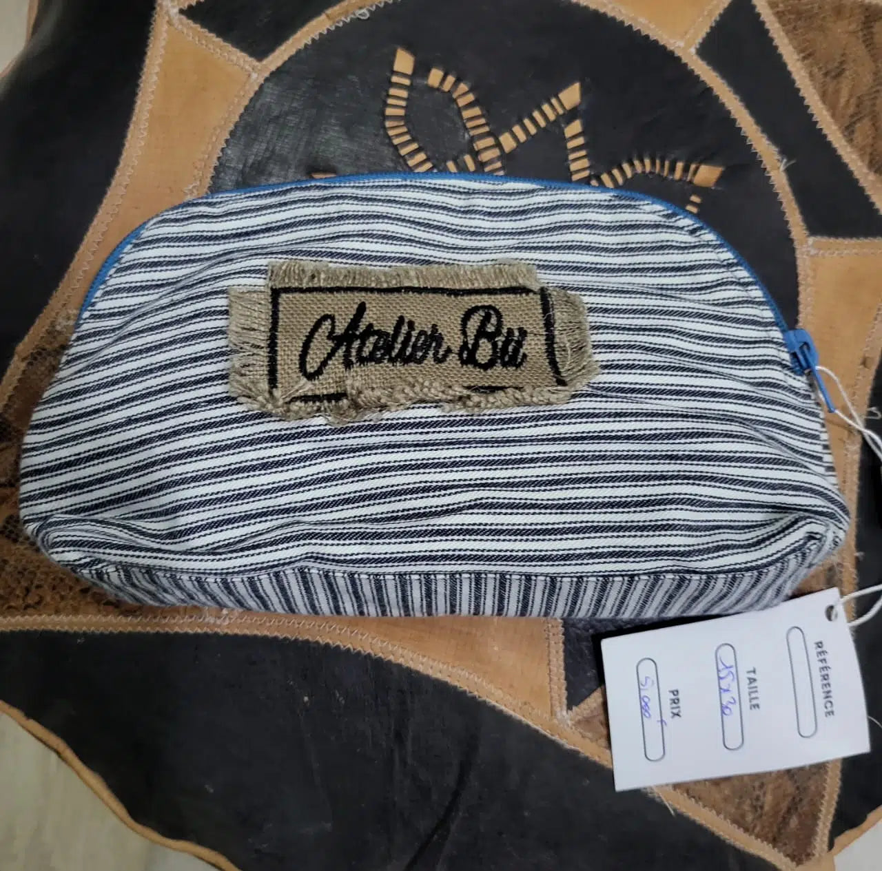 trousse rayée fait main élégante et unique pour tous vos essentiels