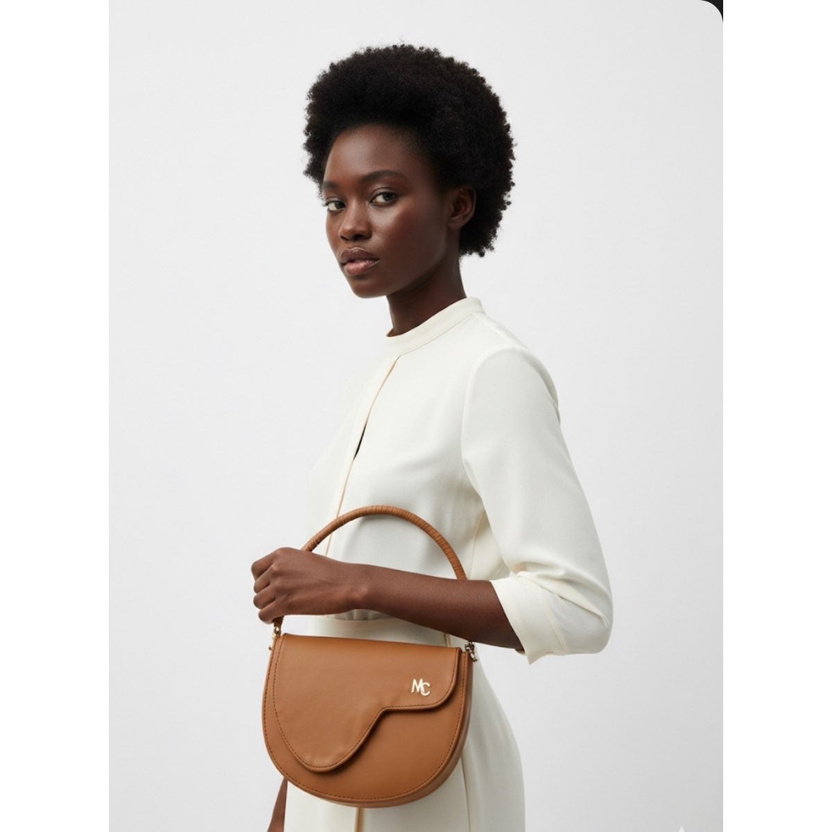 Sac à main cuir camel élégant femme, design contemporain et poignée tressée