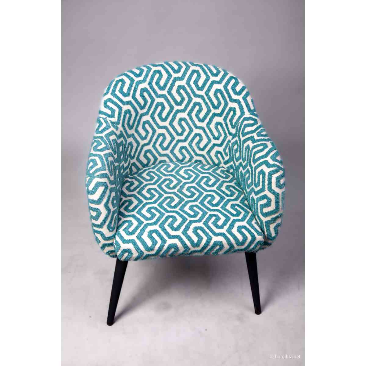 Chaise design moderne turquoise et blanc, confortable, pieds noirs robustes