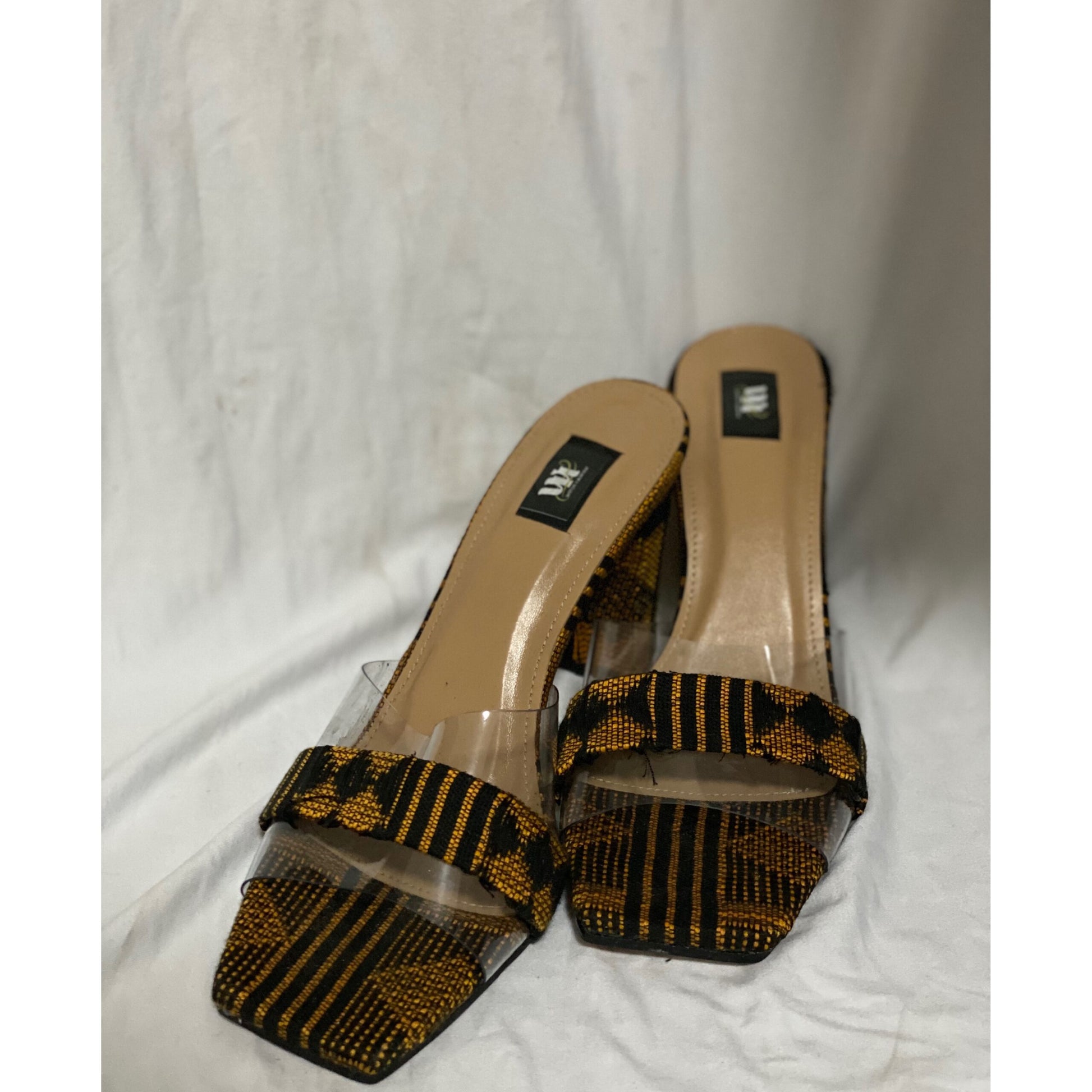 Talons femme pagne orange à bride transparente