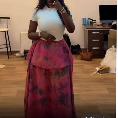 Jupe été femme longue tie-dye fuchsia et noir, fluide et élégante