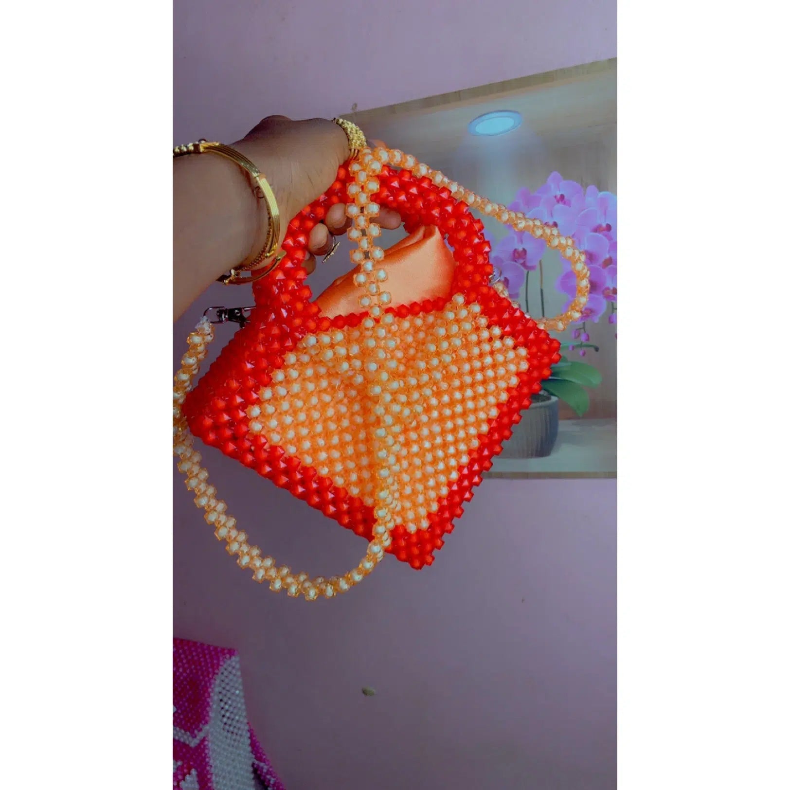 Sac à main en perles rouge et orange