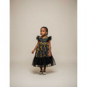 Robe fillette wax noire et jaune, chic cérémonie, motifs africains élégants