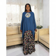 Tunique femme en bleu marine et fleurs (taille L)