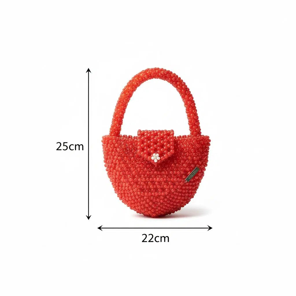 Sac rouge forme cœur en perles rouge