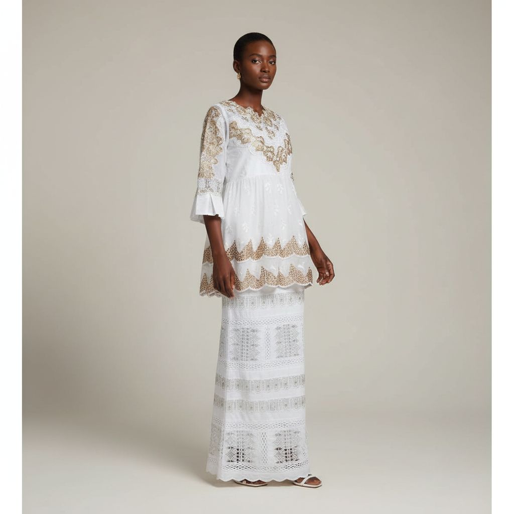 Ensemble marinière pagne femme chic Geztner et voile suisse, broderie dorée