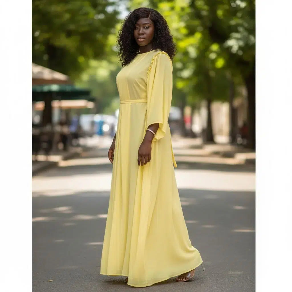 Robe plissée femme longue jaune pastel, élégante et ceinturée à la taille