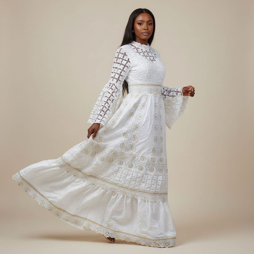 Robe blanche dentelle dorée Geztner longue élégante cérémonie mariage femme