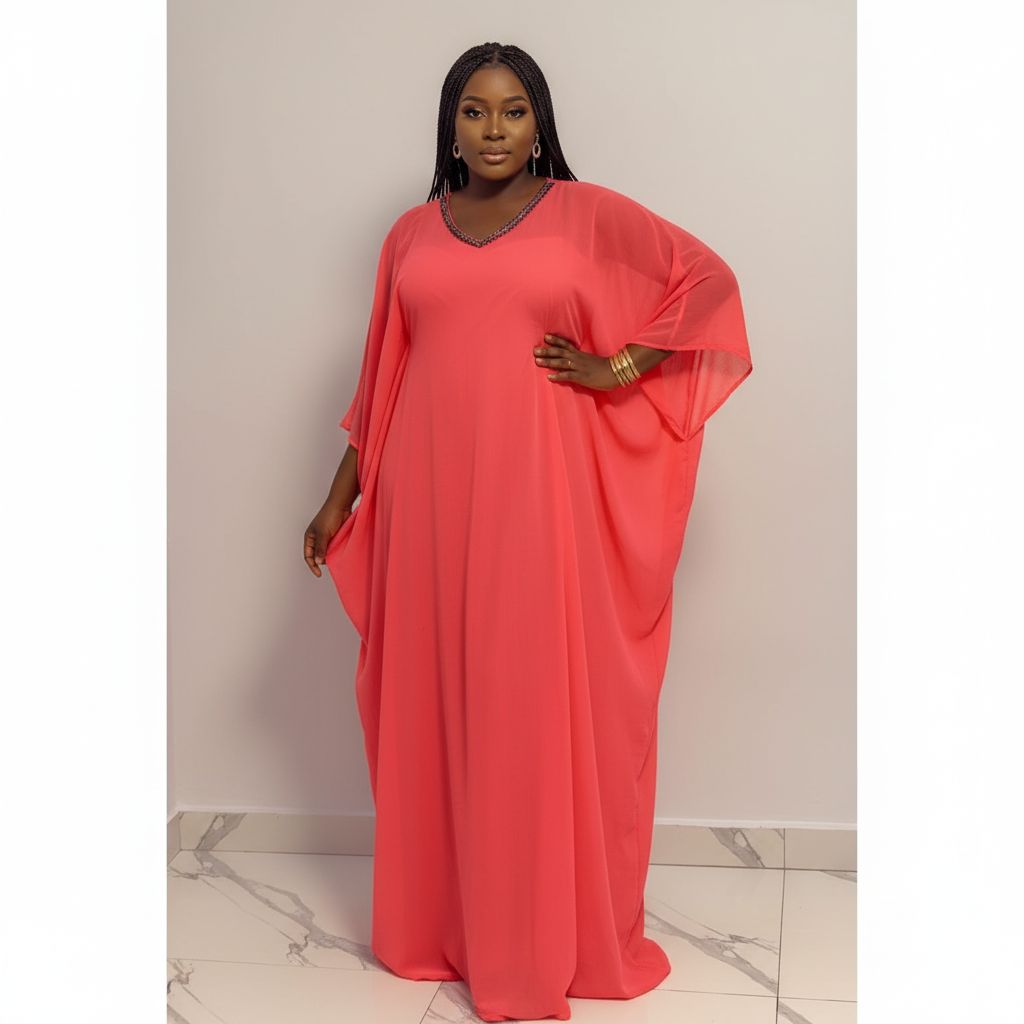 Tunique saumon femme chic avec garniture en strass noirs et robe intérieur