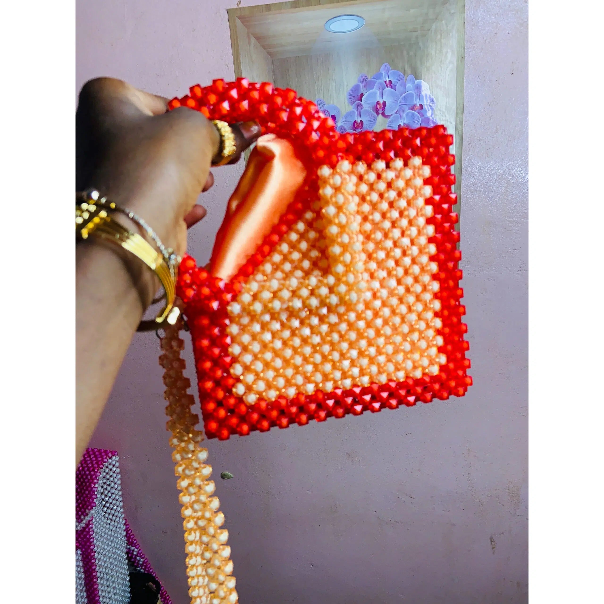 Sac à main en perles rouge et orange