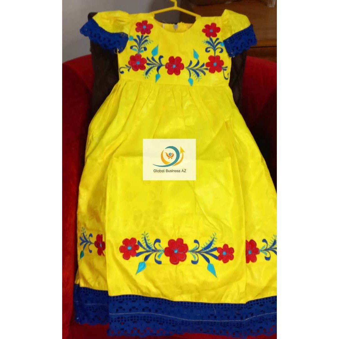 Robe cérémonie fille jaune brodée bazin riche